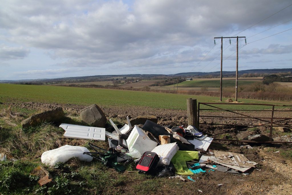 fly tipping near a field